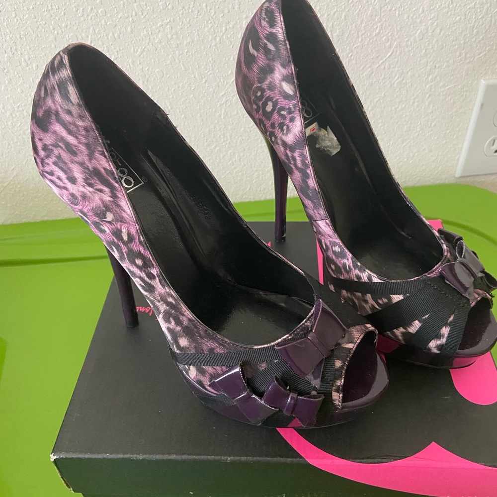 Preloved Animal print platform pumps